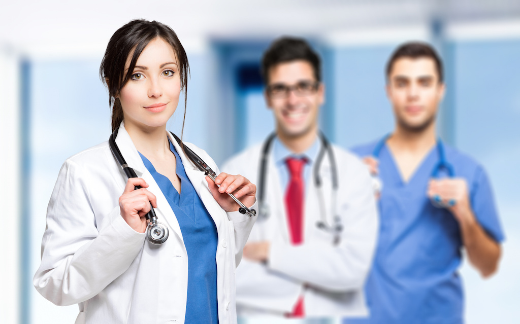 A group of doctors standing next to each other.